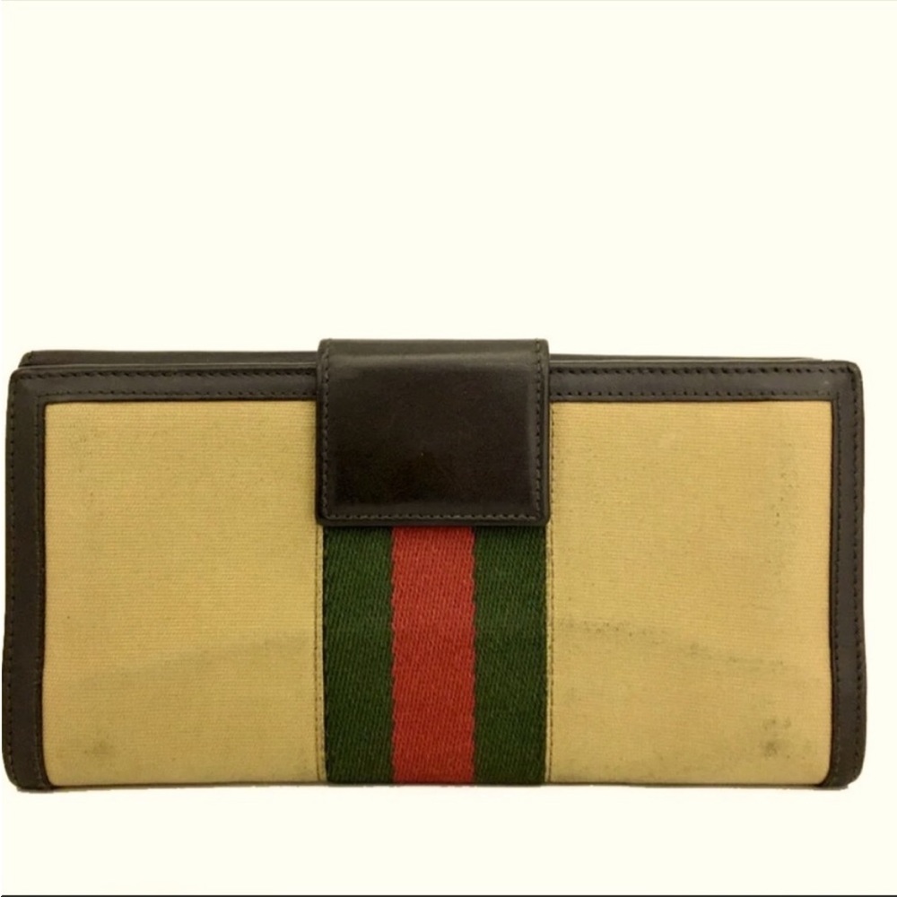 Authentic 💯 Gucci brown and tan leather canvas sherry line striped wallet.